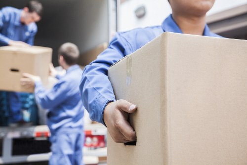 Office removals planning in Watford with boxes and workspace equipment