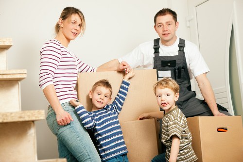 Packing boxes for a Watford home move with organised labelling