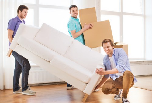 Careful handling of student furniture during a Watford removal