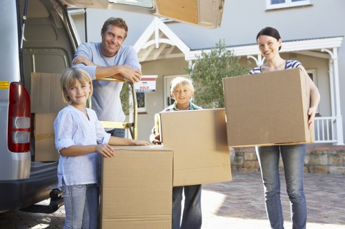 Packing boxes and preparing belongings for a Watford move